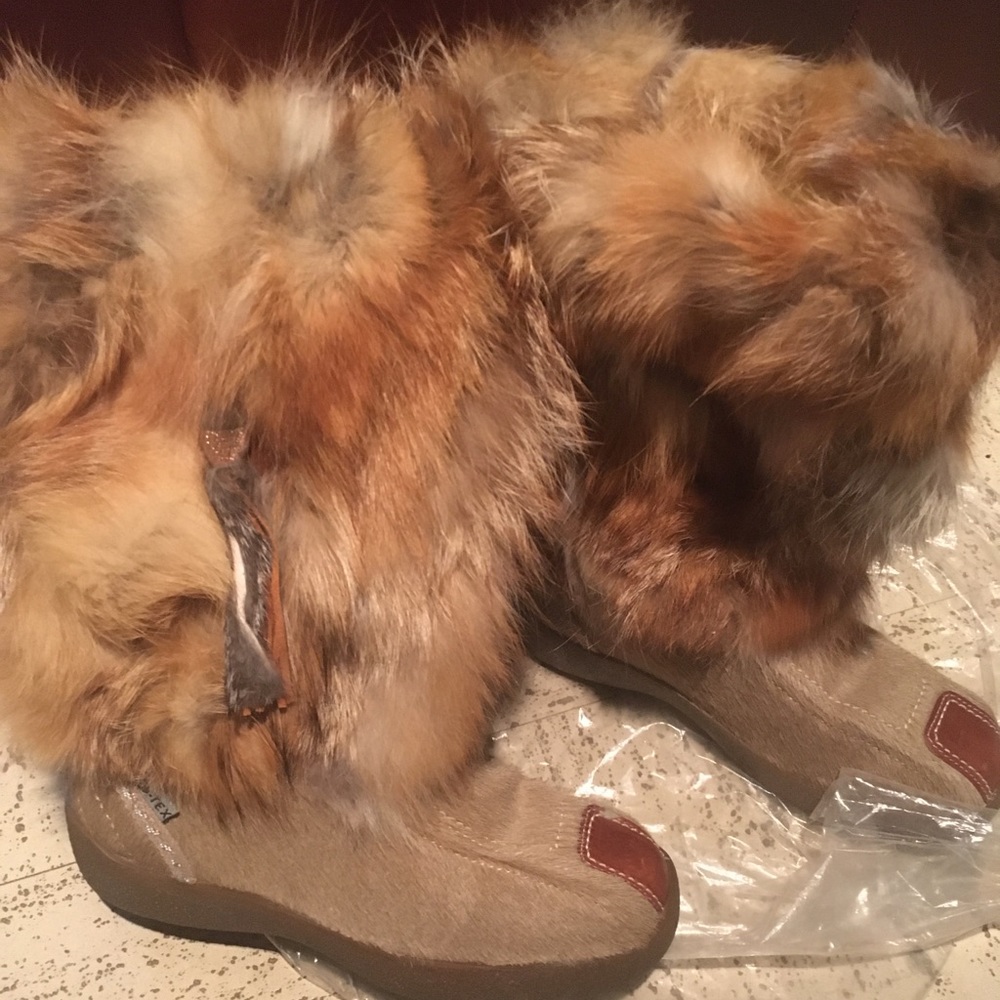 Coyote fur boots. Never worn.